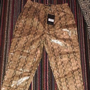 Faux leather snakeskin pants